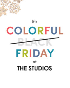 Graphic reading “it’s COLORFUL Friday at THE STUDIOS,” with the word “BLACK” lightly written behind and crossed out by a diagonal black line. “COLORFUL” and “FRIDAY” are spelled out in bold, multi-colored letters (coral, teal, moss green, red, and denim blue), set on a white background with pale, decorative snowflake shapes in the upper left corner.