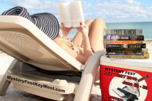 Woman reading mystery novels on beach