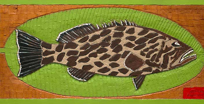 Artwork of a fish with dark brown spots