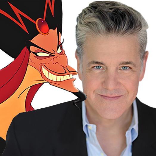 Johnathan Freeman in front of a depiction of his most famous character, Jafar from Disney's Aladdin