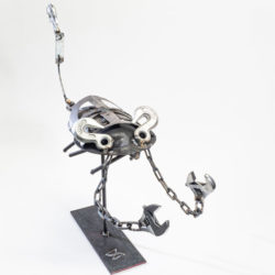 Photo of fanciful metal sculpture of a crab made from repurposed industrial metal