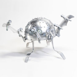 Photo of fanciful metal sculpture of a turtle made from repurposed industrial metal