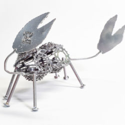 Photo of fanciful metal sculpture of a crab made from repurposed industrial metal