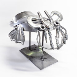 Photo of fanciful metal sculpture of a fish made from repurposed industrial metal