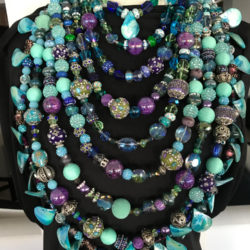 9 Stands, layer short to long of turquoise and purple beads