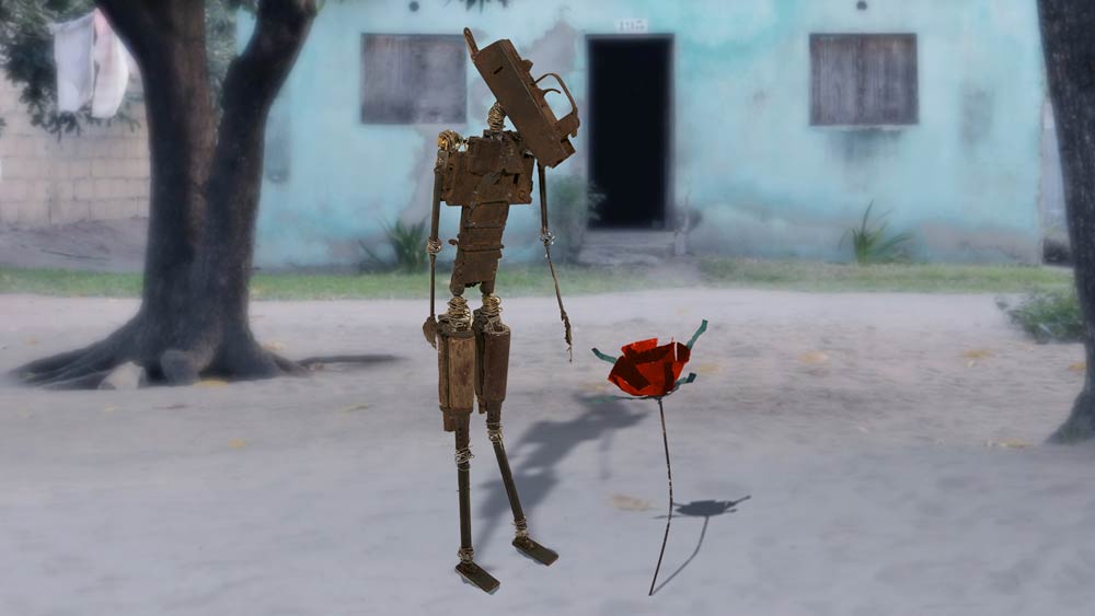 art image of metal sculptures of a human and flower in front of house and tree