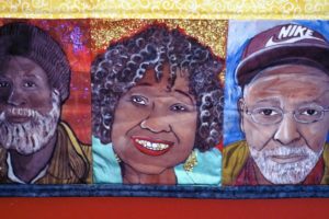 fabric quilt three painted portraits elderly black folk promo William Rhodes Goombay Quilt workshop
