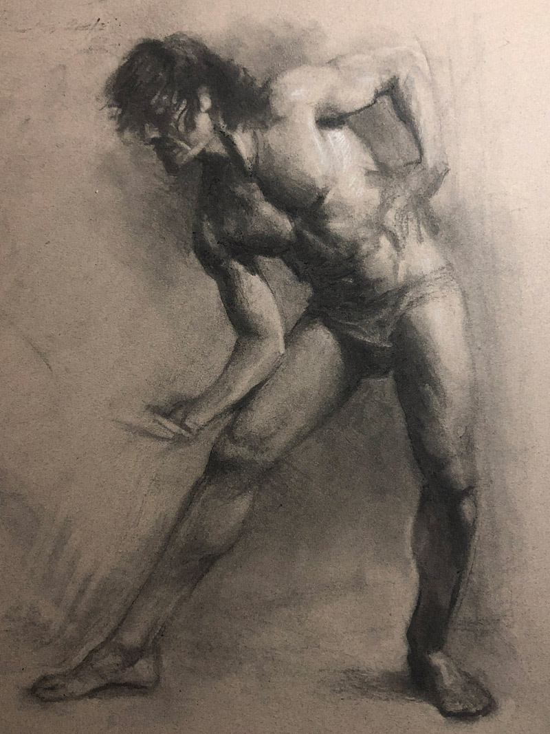 Charcoal figure drawing of a man.