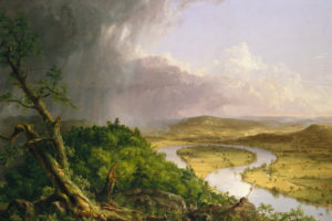 American landscape painting with tree and bushes in the foregrund and a winding river in the background.