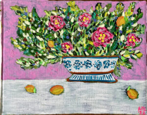 Colorful still life painting of a floral bouquet in a blue-and-white patterned vase with lemons scattered on a white table.