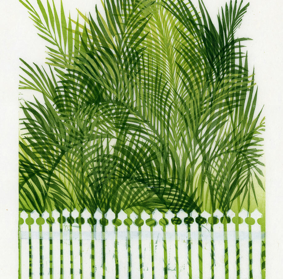 Wood print of palm fronds in various shades of green extending over a white picket fence