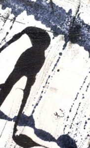 Black and white abstract ink strokes with splattered and dripping textures.