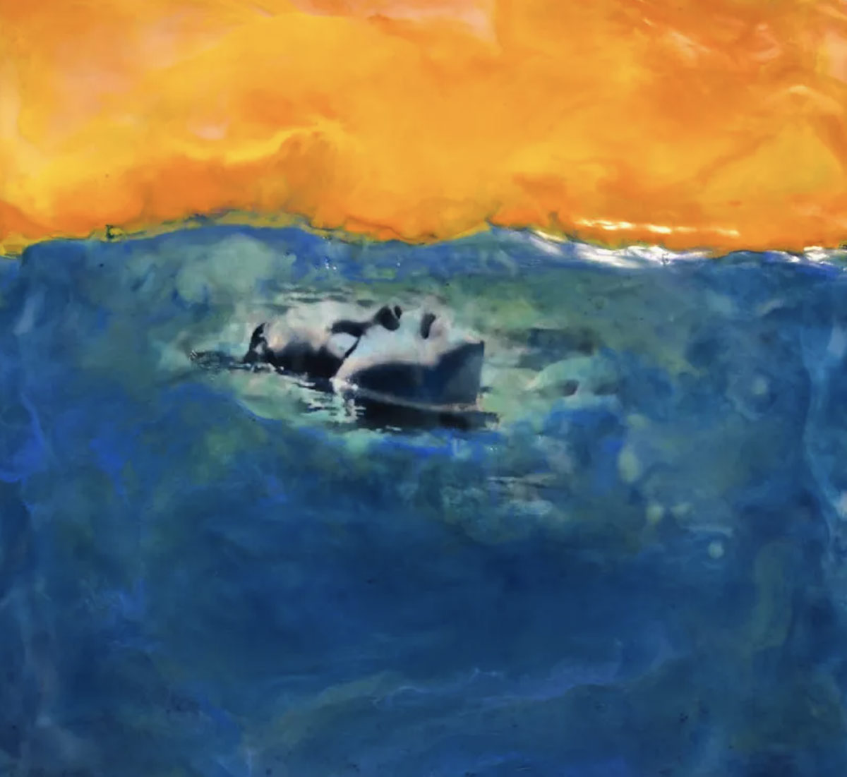 Painting of a face floating serenely in deep blue water beneath a glowing orange sky, blending realism with dreamy abstraction.