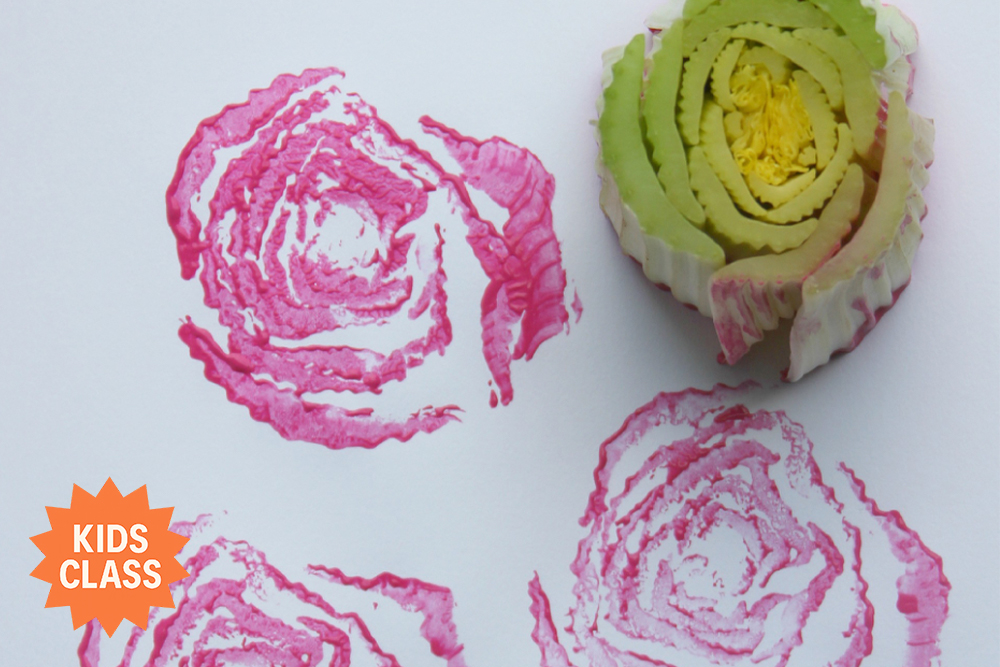 printing-from-nature-kids A cut celery stalk dipped in pink paint creates rose-like prints on white paper, demonstrating a simple and colorful nature-based art technique for kids.