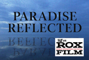 Blue-toned title card reading ‘Paradise Reflected’ over a calm ocean horizon with the text mirrored in the water with roxfilm logo.